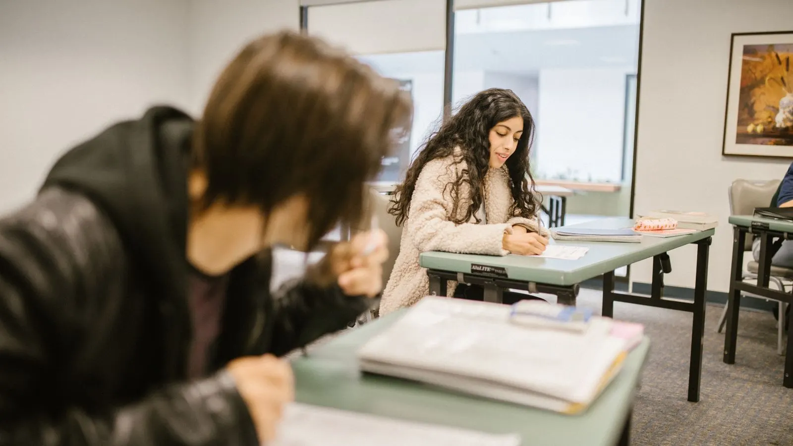 Students working at their desks in a classroom