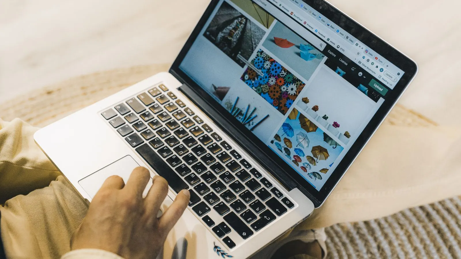 A person reviewing a website on a laptop